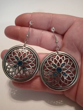 #1181.  Silver Toned, Blue Rhinestone, Floral Earrings.